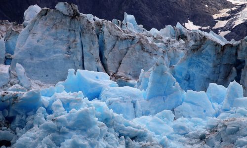 An arctic glacier coast in the mountains in Alaska